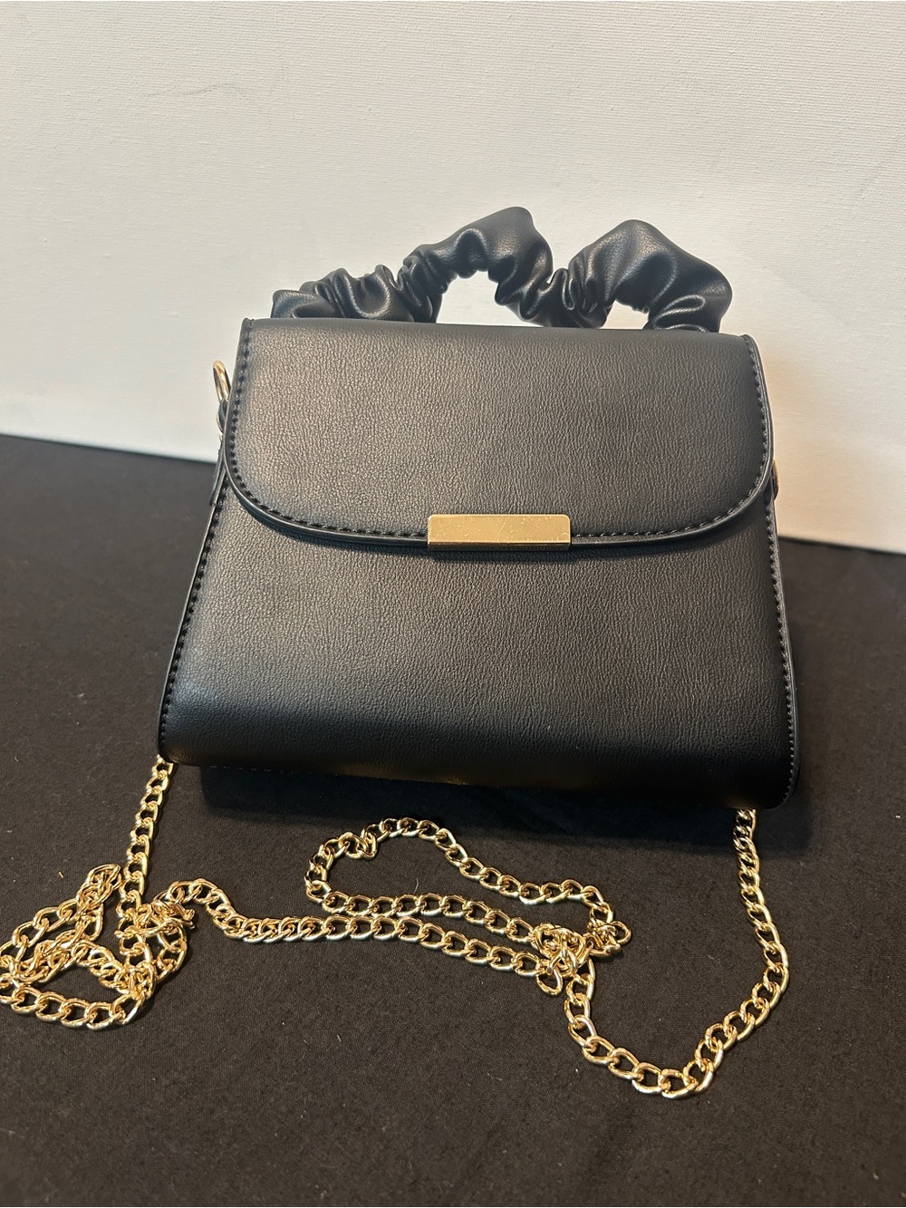 Black Top-Handle Crossbody Bag with Gold Chain